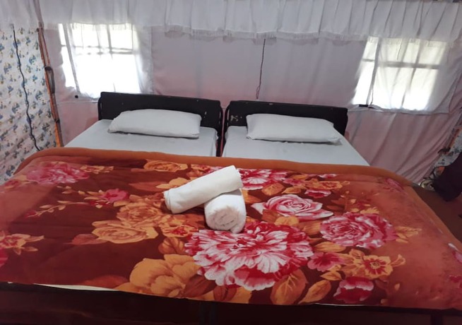 Imagen de la habitación del Hotel Global Kumbh Village - Hostel. Foto 4