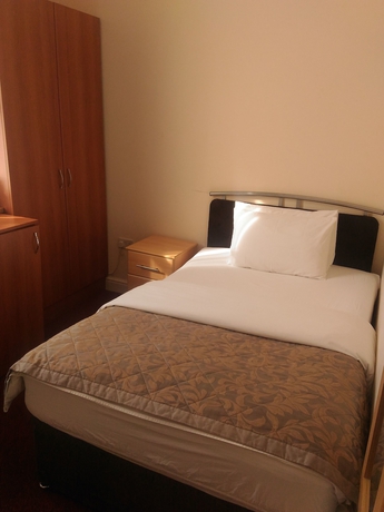 Imagen de la habitación del Hotel Global Lodge. Foto 5