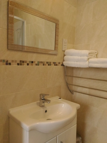 Imagen de la habitación del Hotel Global Lodge. Foto 6