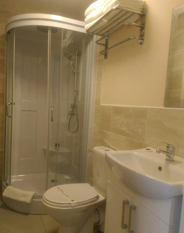 Imagen de la habitación del Hotel Global Lodge. Foto 14