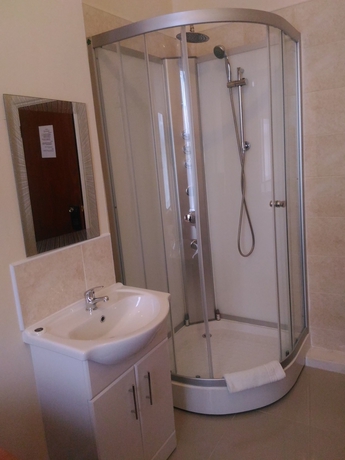 Imagen de la habitación del Hotel Global Lodge. Foto 15