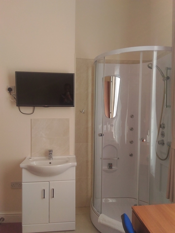 Imagen de la habitación del Hotel Global Lodge. Foto 18