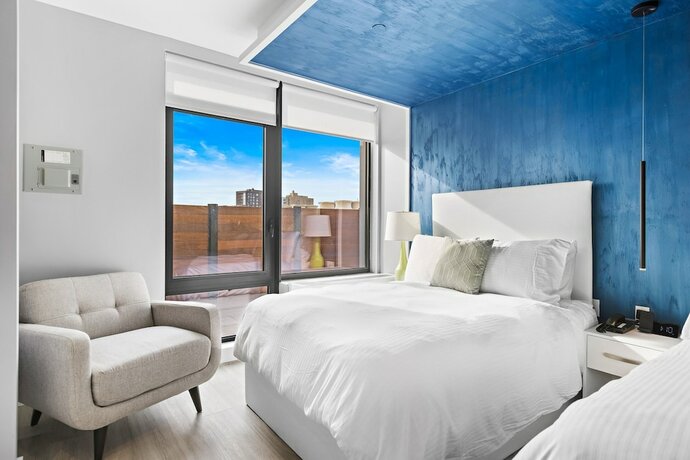Imagen de la habitación del Hotel Global Luxury Suites at The Arches. Foto 14