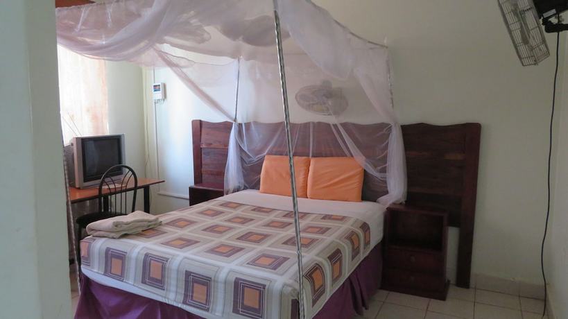 Imagen de la habitación del Hotel Global Village. Foto 3