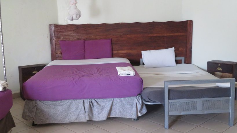 Imagen de la habitación del Hotel Global Village. Foto 6