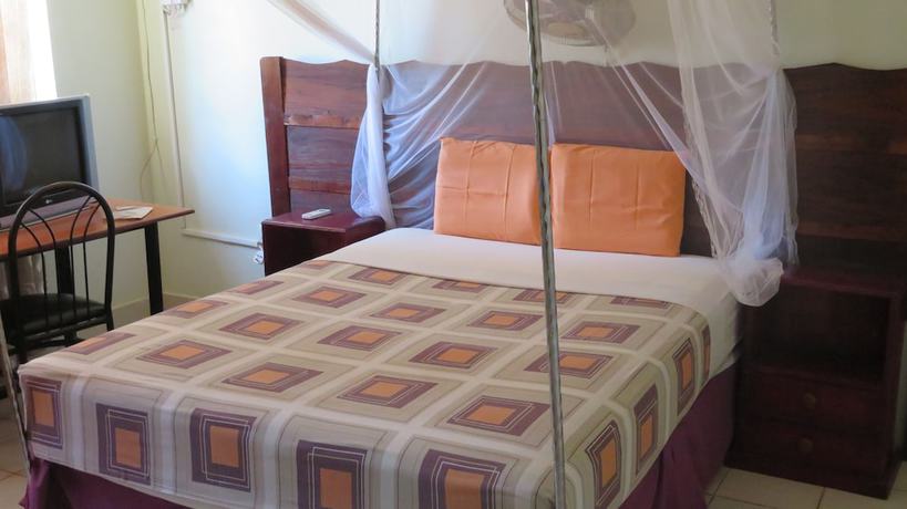 Imagen de la habitación del Hotel Global Village. Foto 7