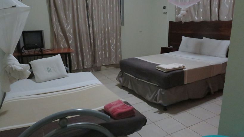 Imagen de la habitación del Hotel Global Village. Foto 9