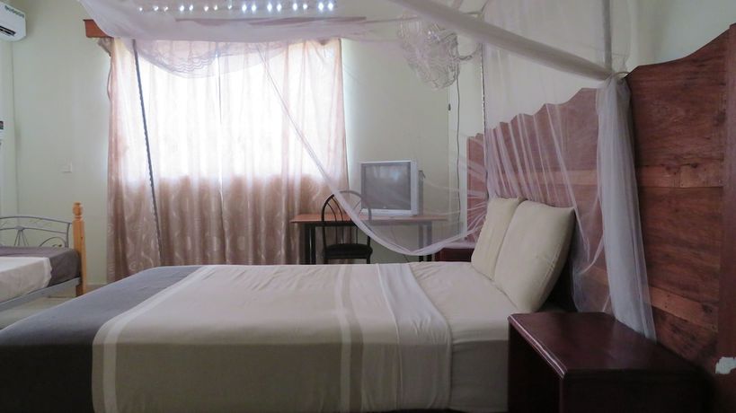 Imagen de la habitación del Hotel Global Village. Foto 10