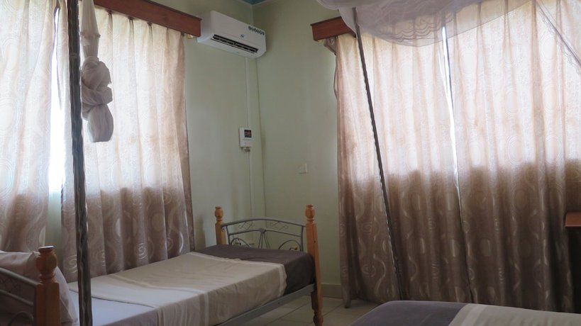 Imagen de la habitación del Hotel Global Village. Foto 13