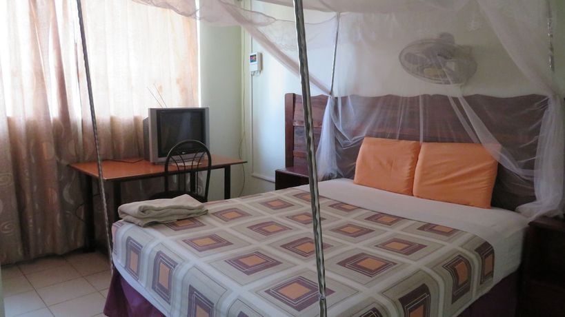 Imagen de la habitación del Hotel Global Village. Foto 14