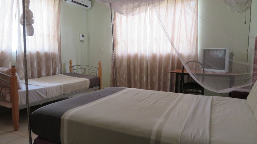 Imagen de la habitación del Hotel Global Village. Foto 17