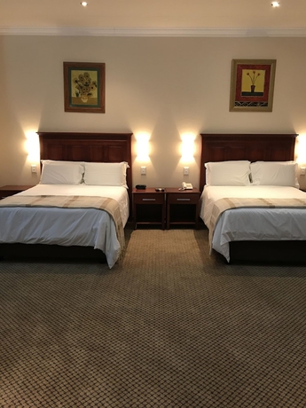 Imagen de la habitación del Hotel Global Village Guest House. Foto 2