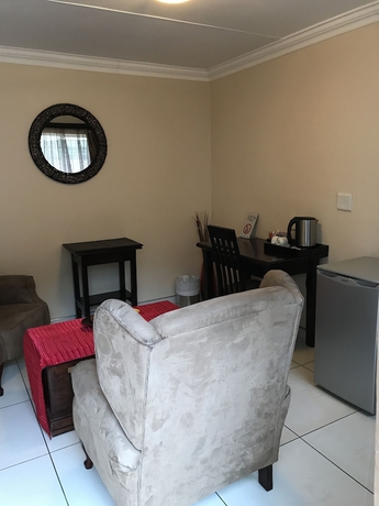 Imagen de la habitación del Hotel Global Village Guest House. Foto 4