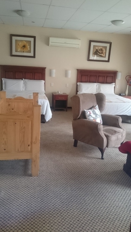 Imagen de la habitación del Hotel Global Village Guest House. Foto 5