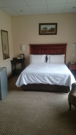 Imagen de la habitación del Hotel Global Village Guest House. Foto 7