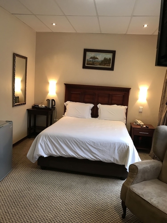 Imagen de la habitación del Hotel Global Village Guest House. Foto 8