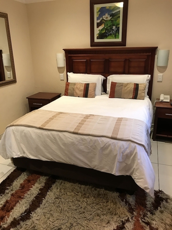 Imagen de la habitación del Hotel Global Village Guest House. Foto 9