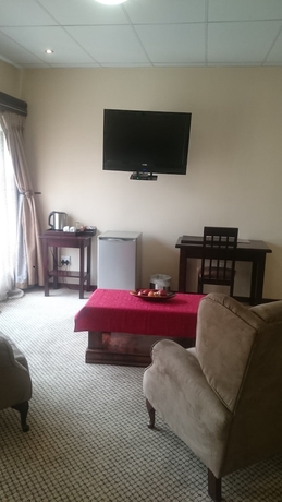 Imagen de la habitación del Hotel Global Village Guest House. Foto 13