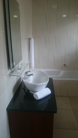 Imagen de la habitación del Hotel Global Village Guest House. Foto 14