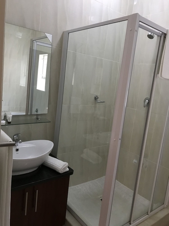 Imagen de la habitación del Hotel Global Village Guest House. Foto 16