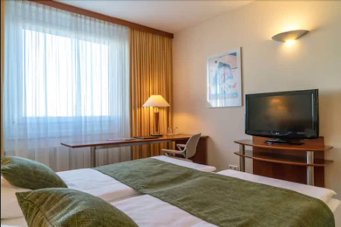 Imagen de la habitación del Hotel Globana Airport. Foto 13