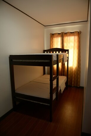 Imagen de la habitación del Hotel Globetrotter Inn Palawan. Foto 25