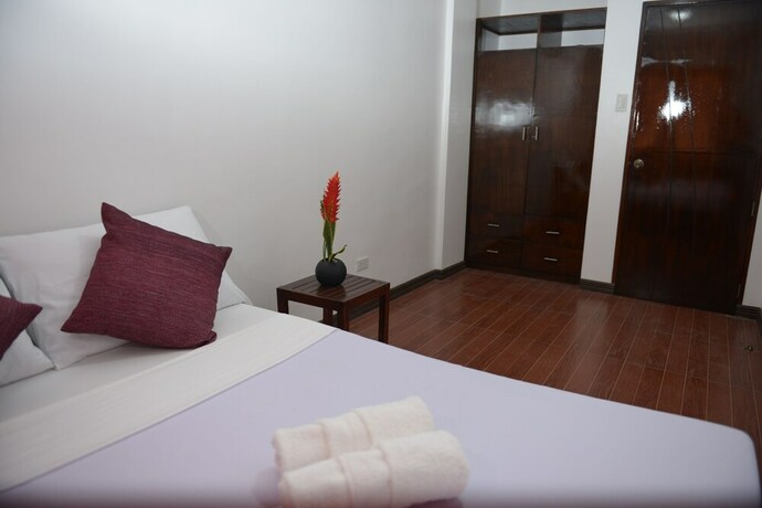 Imagen de la habitación del Hotel Globetrotter Inn Palawan. Foto 31