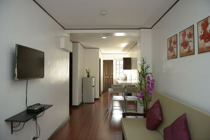 Imagen de la habitación del Hotel Globetrotter Inn Palawan. Foto 32