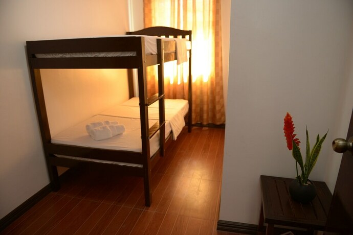 Imagen de la habitación del Hotel Globetrotter Inn Palawan. Foto 34