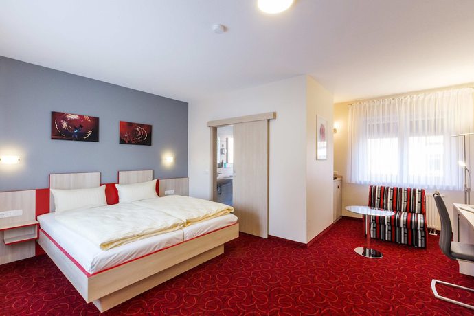 Imagen de la habitación del Hotel Globotel Business. Foto 5