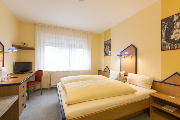 Imagen de la habitación del Hotel Globotel Business. Foto 15