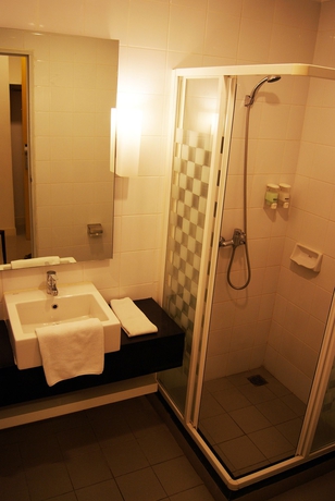 Imagen de la habitación del Hotel Glodok Plaza. Foto 5