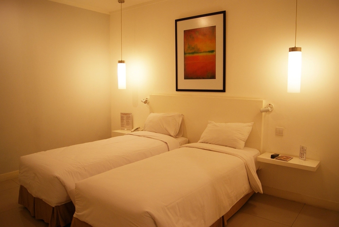 Imagen de la habitación del Hotel Glodok Plaza. Foto 6