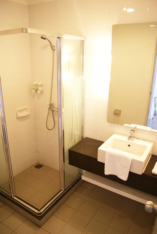 Imagen de la habitación del Hotel Glodok Plaza. Foto 11