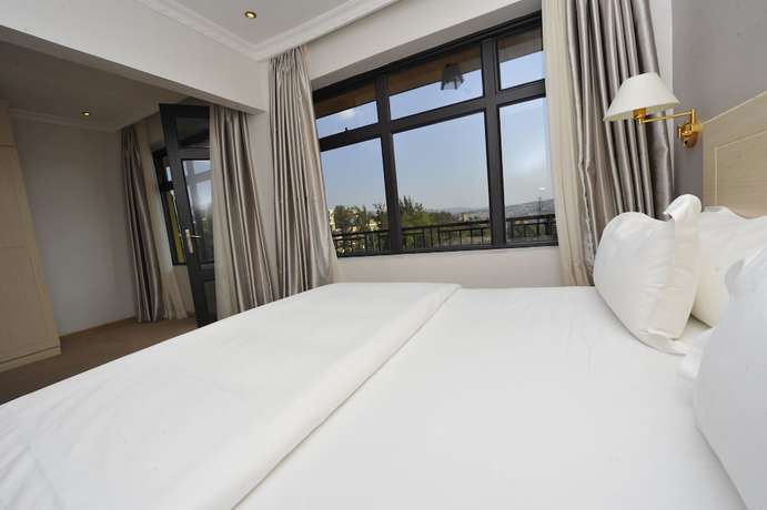 Imagen de la habitación del Hotel Gloria, Kigali. Foto 10