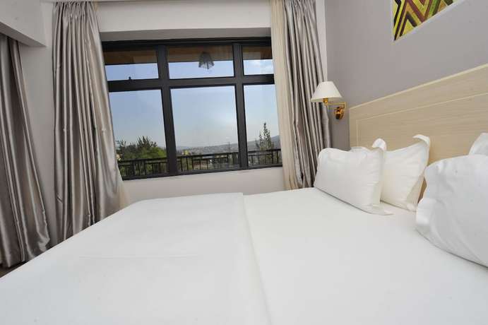 Imagen de la habitación del Hotel Gloria, Kigali. Foto 11