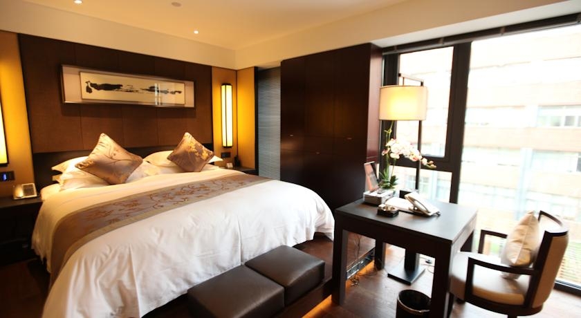 Imagen de la habitación del Hotel Gloria Plaza Dongsheng. Foto 5