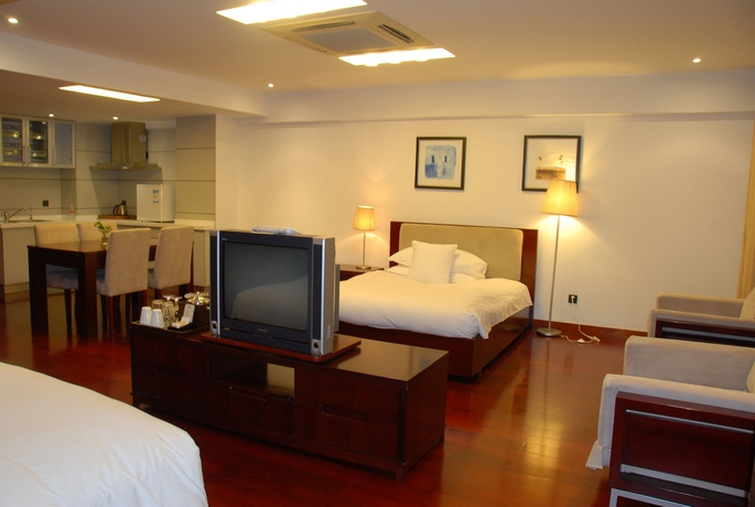 Imagen de la habitación del Hotel Gloria Plaza Kangqiao Shanghai. Foto 3