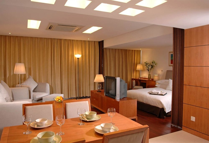Imagen de la habitación del Hotel Gloria Plaza Kangqiao Shanghai. Foto 5