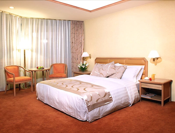 Imagen de la habitación del Hotel Gloria Plaza Shenyang. Foto 9