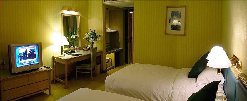 Imagen de la habitación del Hotel Gloria Plaza Shenyang. Foto 11