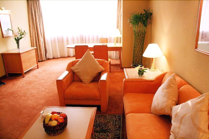 Imagen de la habitación del Hotel Gloria Plaza Shenyang. Foto 13