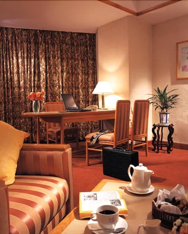 Imagen de la habitación del Hotel Gloria Plaza Shenyang. Foto 14
