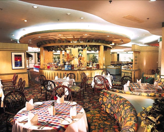 Imagen del bar/restaurante del Hotel Gloria Plaza Shenyang. Foto 2