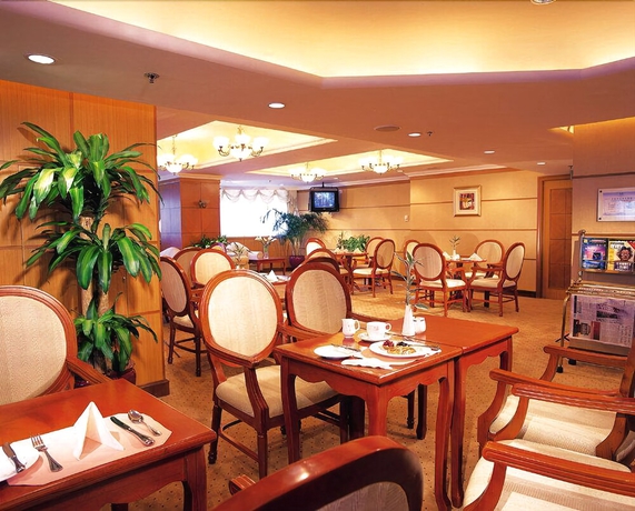 Imagen del bar/restaurante del Hotel Gloria Plaza Shenyang. Foto 5