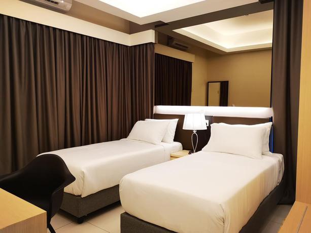 Imagen de la habitación del Hotel Gloria Residences Ion Delemen. Foto 7