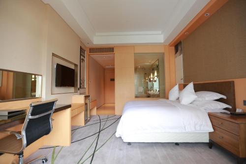 Imagen de la habitación del Hotel Gloria Resorts Jingdezhen Xishan Lake. Foto 6