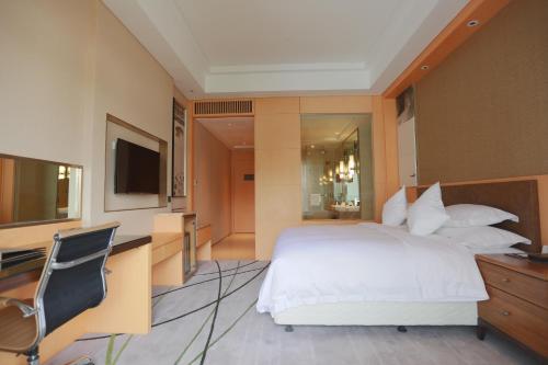 Imagen de la habitación del Hotel Gloria Resorts Jingdezhen Xishan Lake. Foto 7
