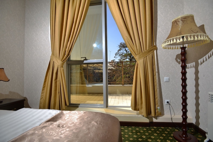 Imagen de la habitación del Hotel Gloria, Taskent. Foto 3