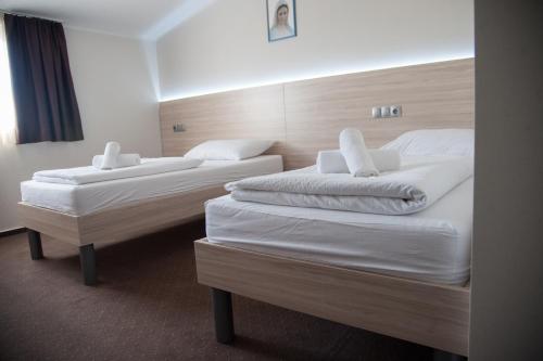 Imagen de la habitación del Hotel Glorija. Foto 20